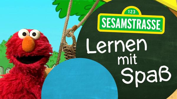 Elmo mit dem Logo "Lernen mit Spaß" | Rechte: NDR/Sesamstsraße Foto: Grafik